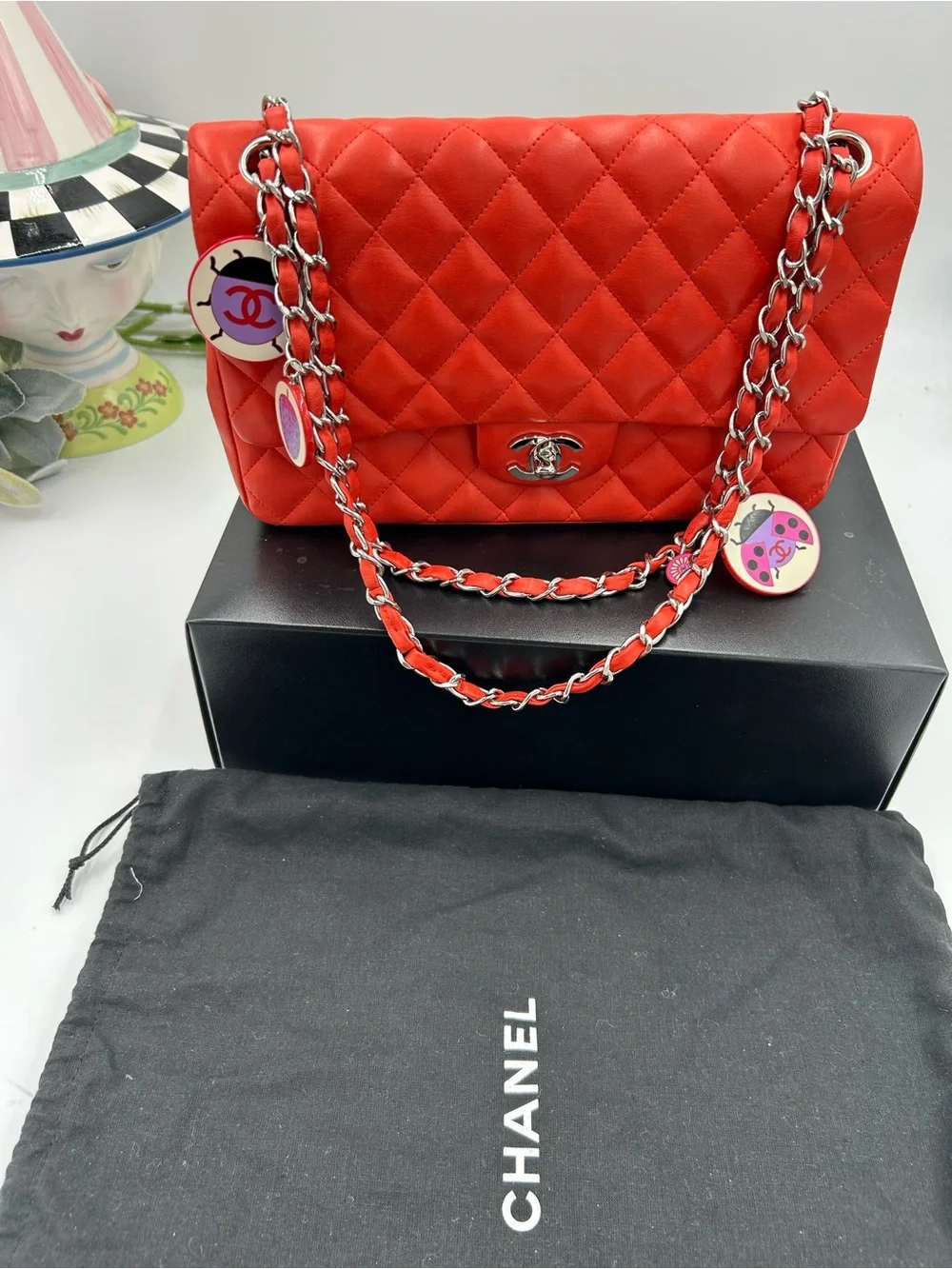 Women's Chanel MATELASSE lambskin shoulder Bag ladybug, and strawberry charms.